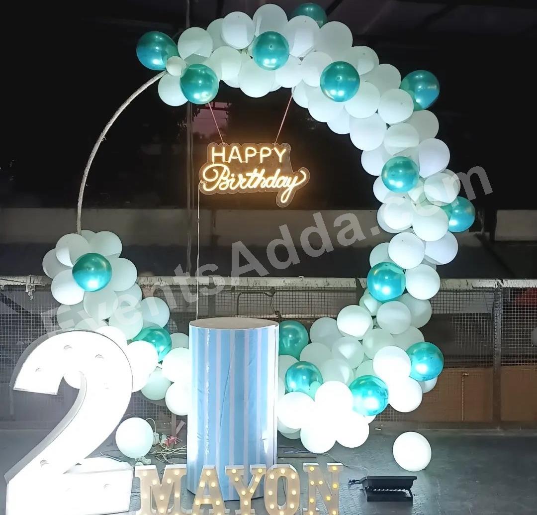 aqua-blue-and-white-2nd-birthday-balloon-ring-decoration in Nagarkurnool