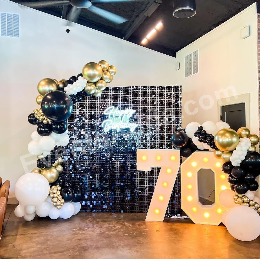black--gold-shimmer-70th-birthday-backdrop-decoration in Vijayawada