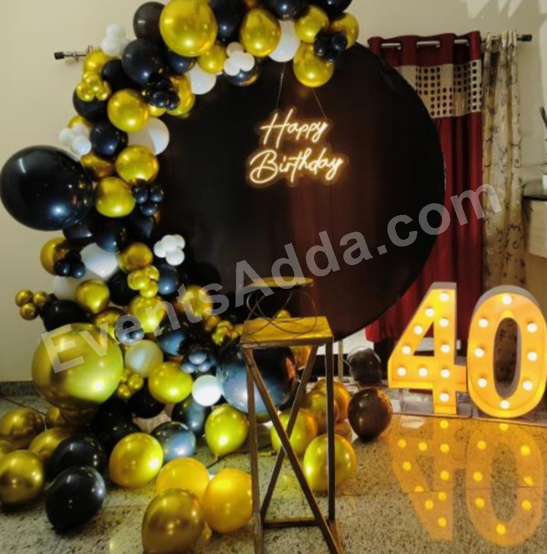 black-and-gold-40th-birthday-backdrop-decoration-2.jpg