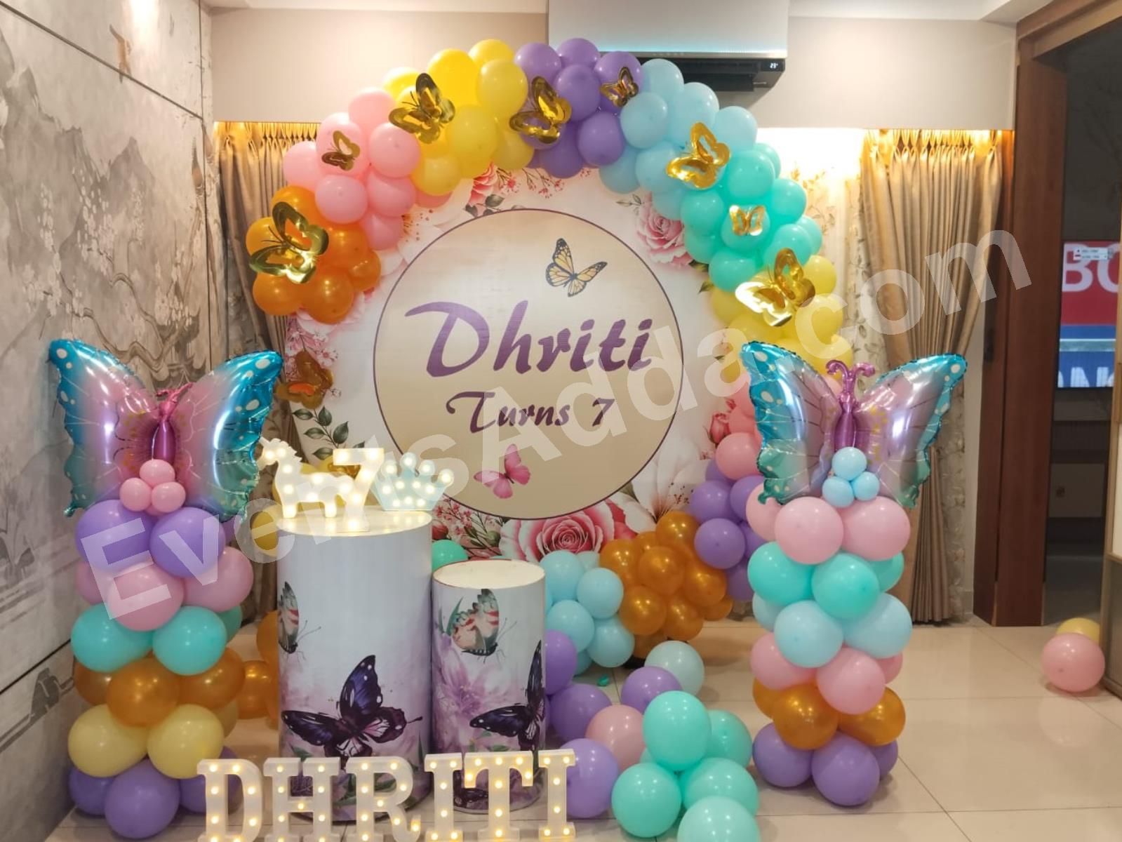 butterfly-rainbow-theme-7th-birthday-balloon-decoration-2.jpg