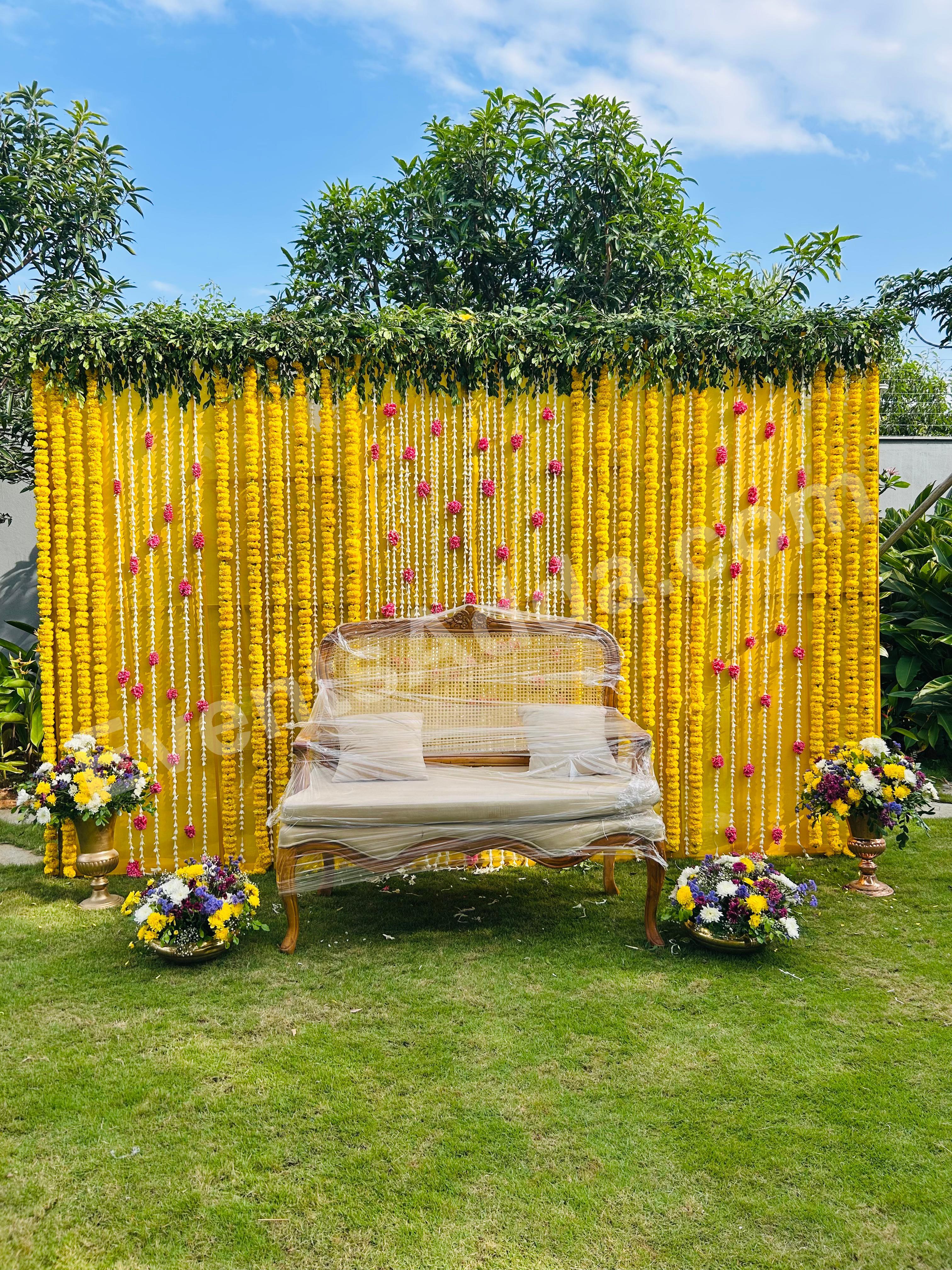 classic-marigold-haldi-backdrop-decoration Decoration in =Hyderabad