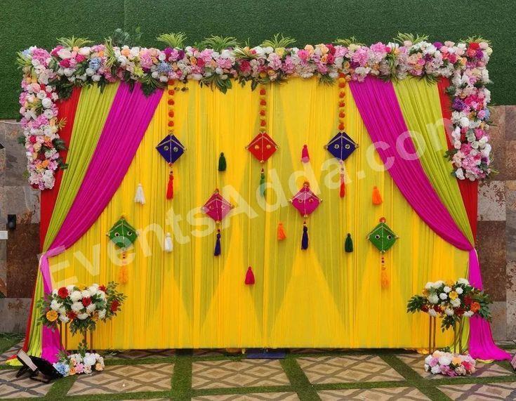 colorful-floral-draped-haldi-ceremony-decoration in Ahmedabad
