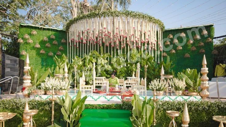 elegant-circular-floral-hanging-haldi-stage-decoration Decoration in =Chandigarh