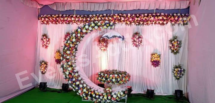 elegant-floral-crescent-moon-swing-decoration in Hyderabad