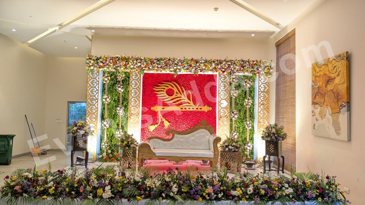 elegant-floral-krishna-theme-wedding-stage-decoration in Dubai