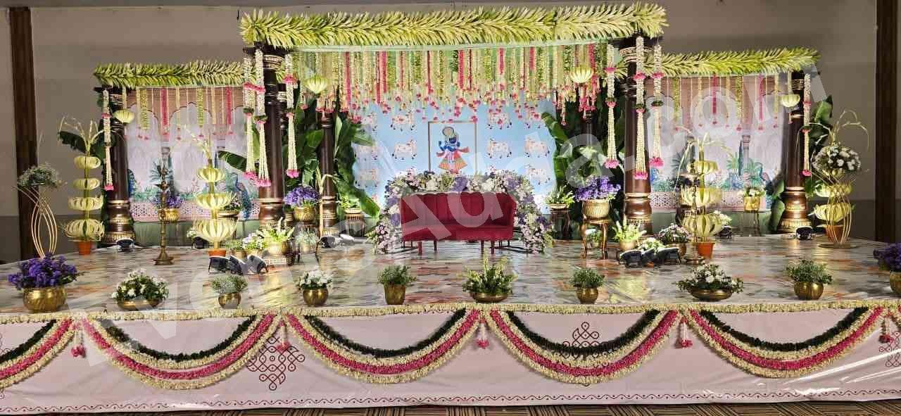 Elegant Floral Stage Decoration with Traditional Hanging Garlands in Udaipur