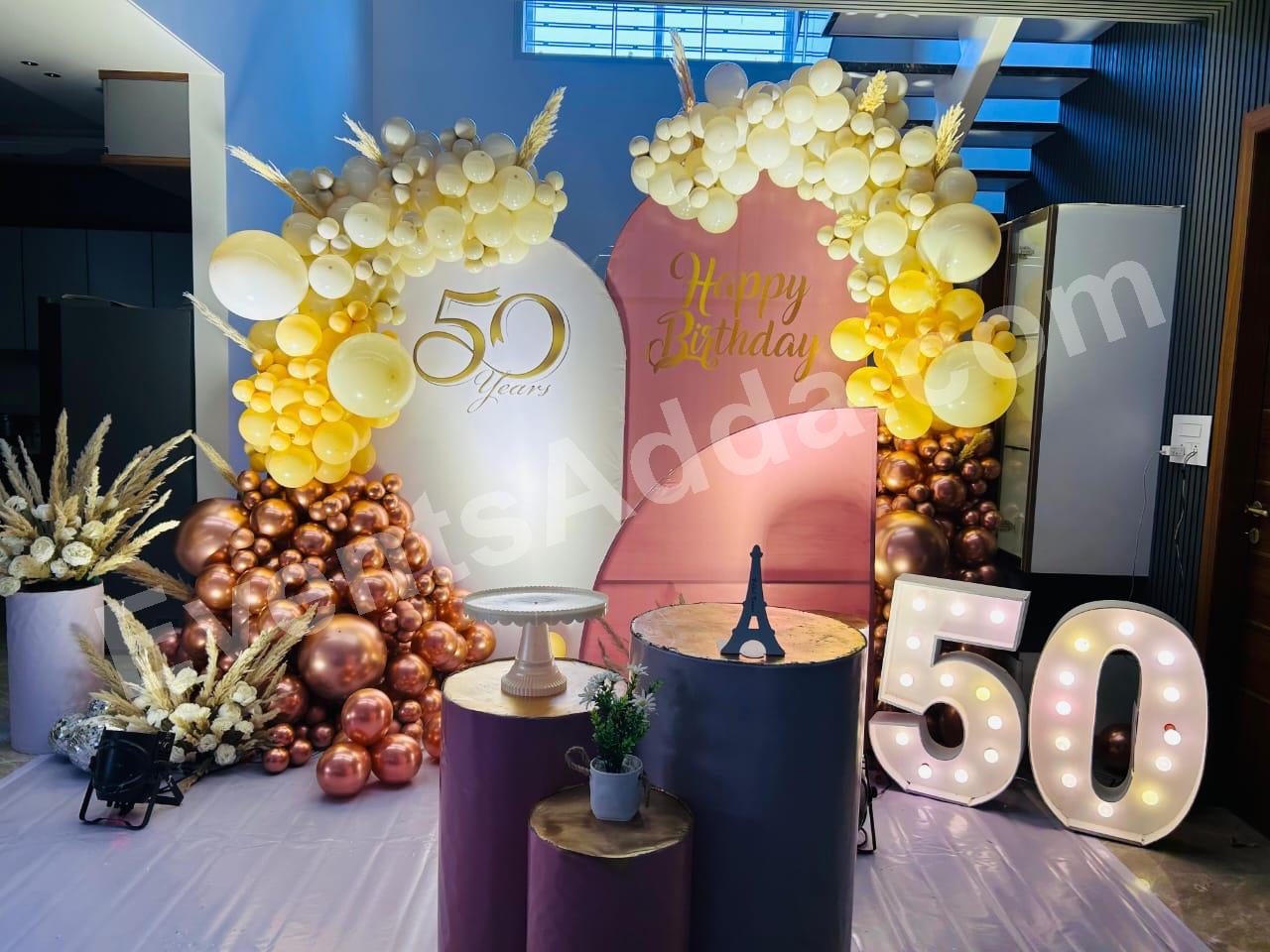 elegant-golden-50th-birthday-balloon-decoration in Ahmedabad
