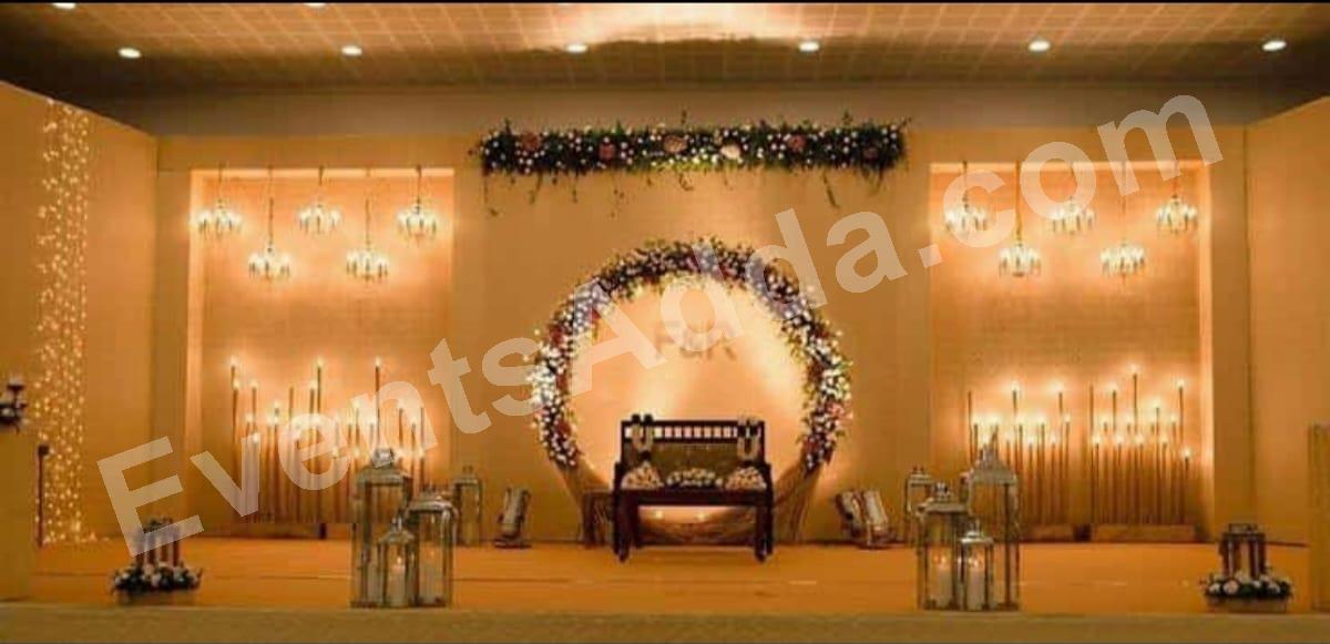 elegant-golden-floral-ring-wedding-stage-decoration in Ahmedabad