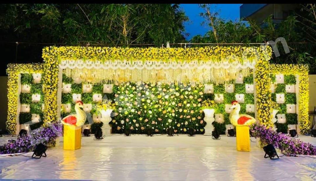elegant-green--yellow-floral-stage-decoration in Hyderabad