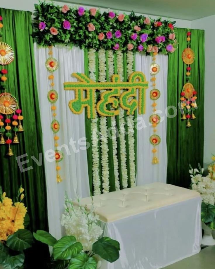 elegant-green-and-white-mehandhi-ceremony-decoration-4.jpg