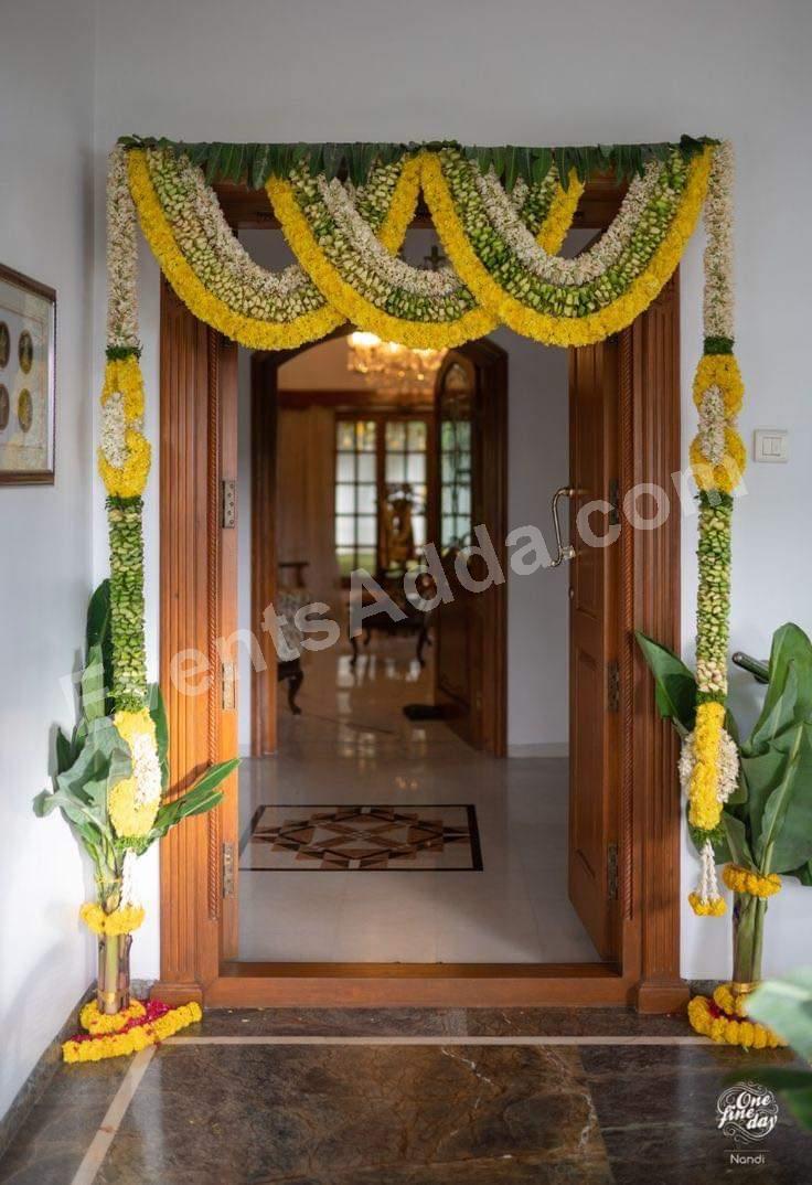 Elegant Jasmine and Marigold Floral Door Entrance Decoration Decoration in Siddipet