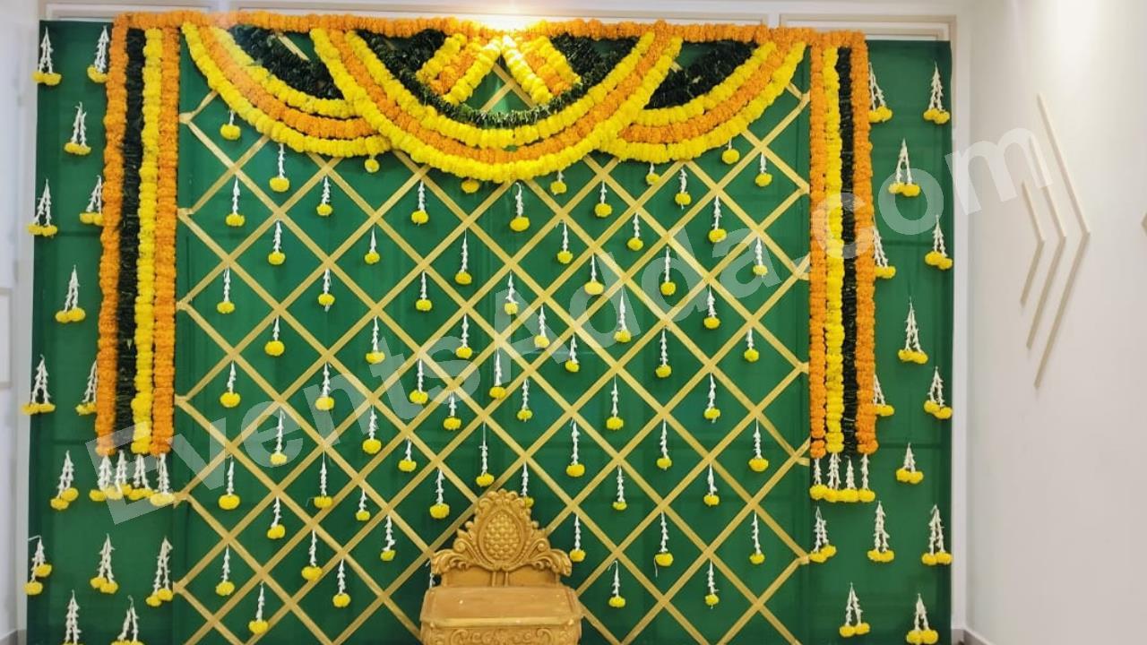 elegant-marigold-lattice-haldi-ceremony-backdrop-decoration-2.jpg