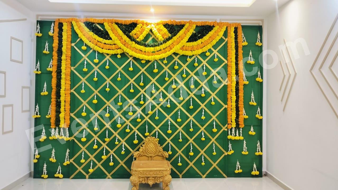 elegant-marigold-lattice-haldi-ceremony-backdrop-decoration Decoration in =Dubai