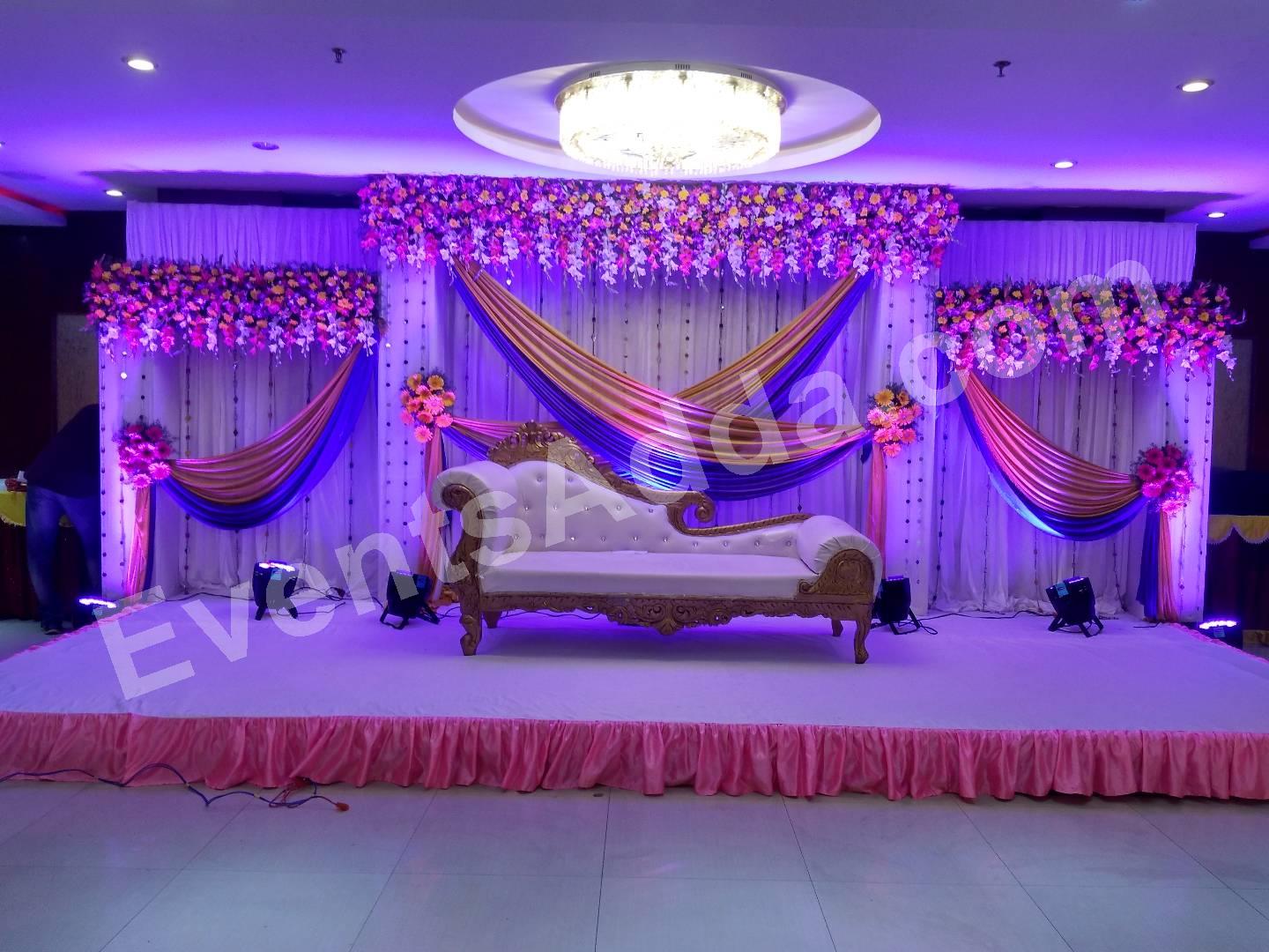 elegant-purple--gold-floral-sofa-stage-decoration in Bangalore