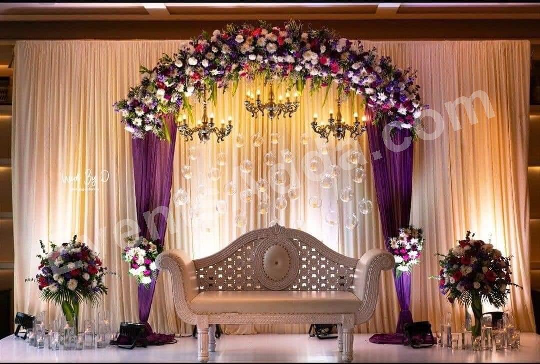 elegant-purple-floral-wedding-stage-decoration in Ahmedabad