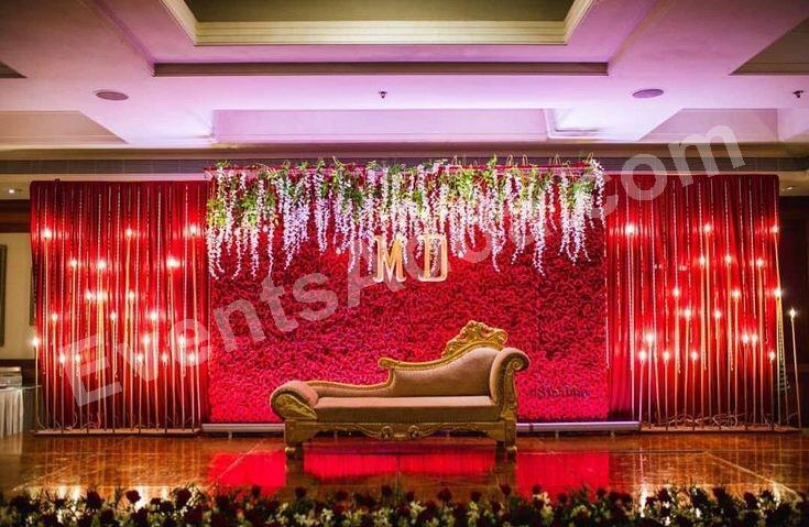 elegant-red-floral-sofa-stage-decoration in Bangalore