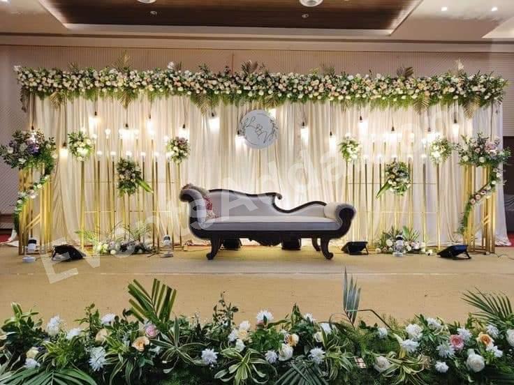 elegant-white-and-green-floral-reception-stage-decoration-2 in Udaipur