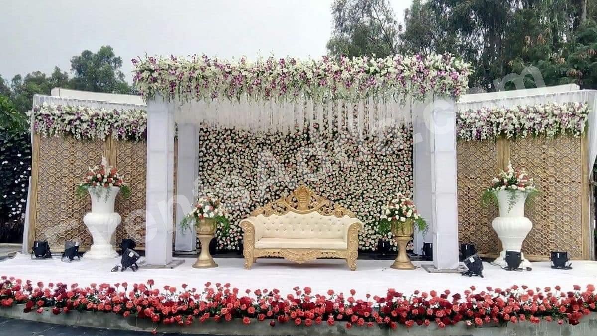 elegant-white-and-pink-floral-reception-stage-decoration in Vizag