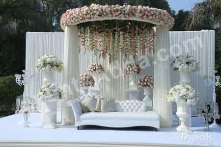 elegant-white-floral-canopy-wedding-stage-decoration in Ahmedabad