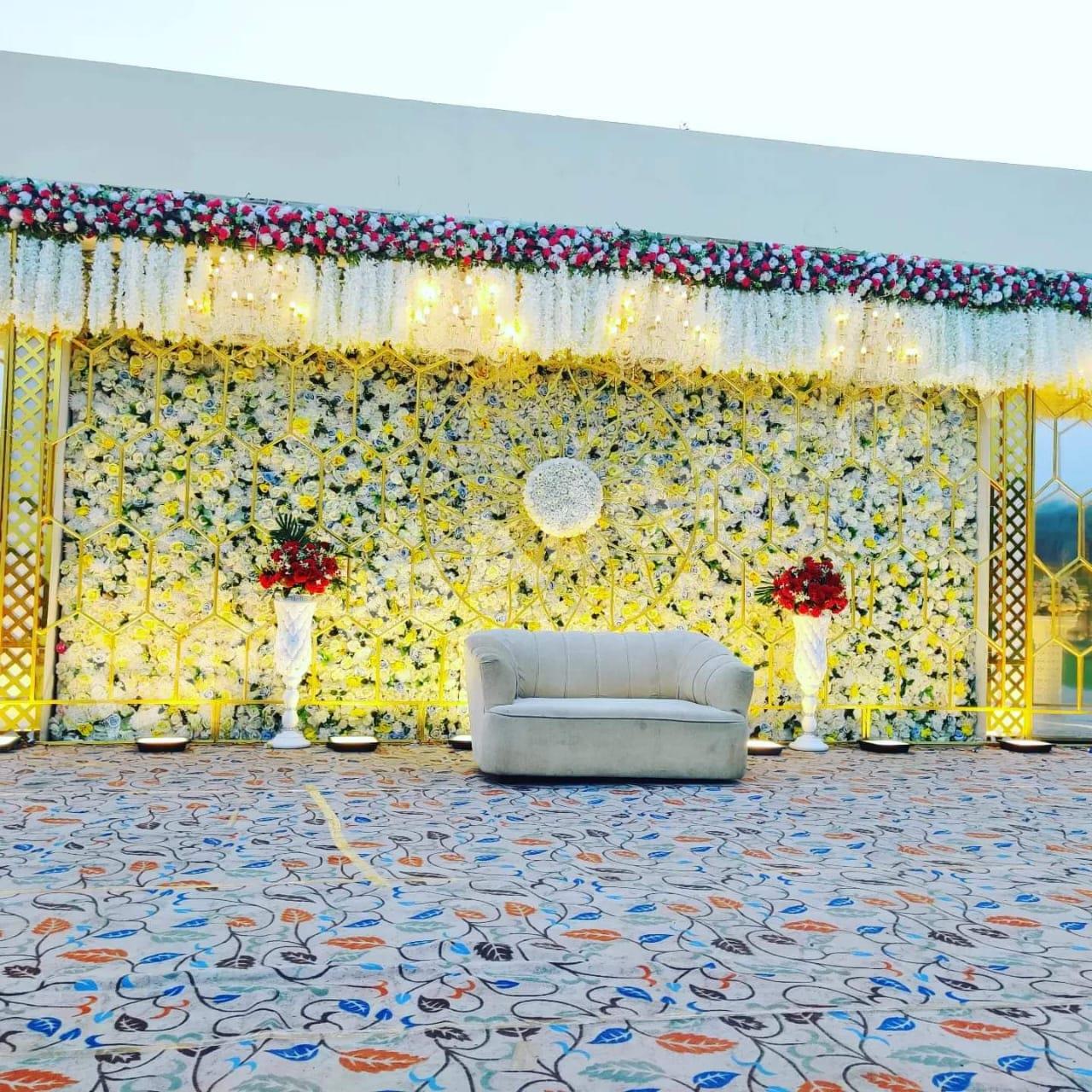 elegant-white-floral-gold-geometric-reception-stage-decoration in Warangal Rural