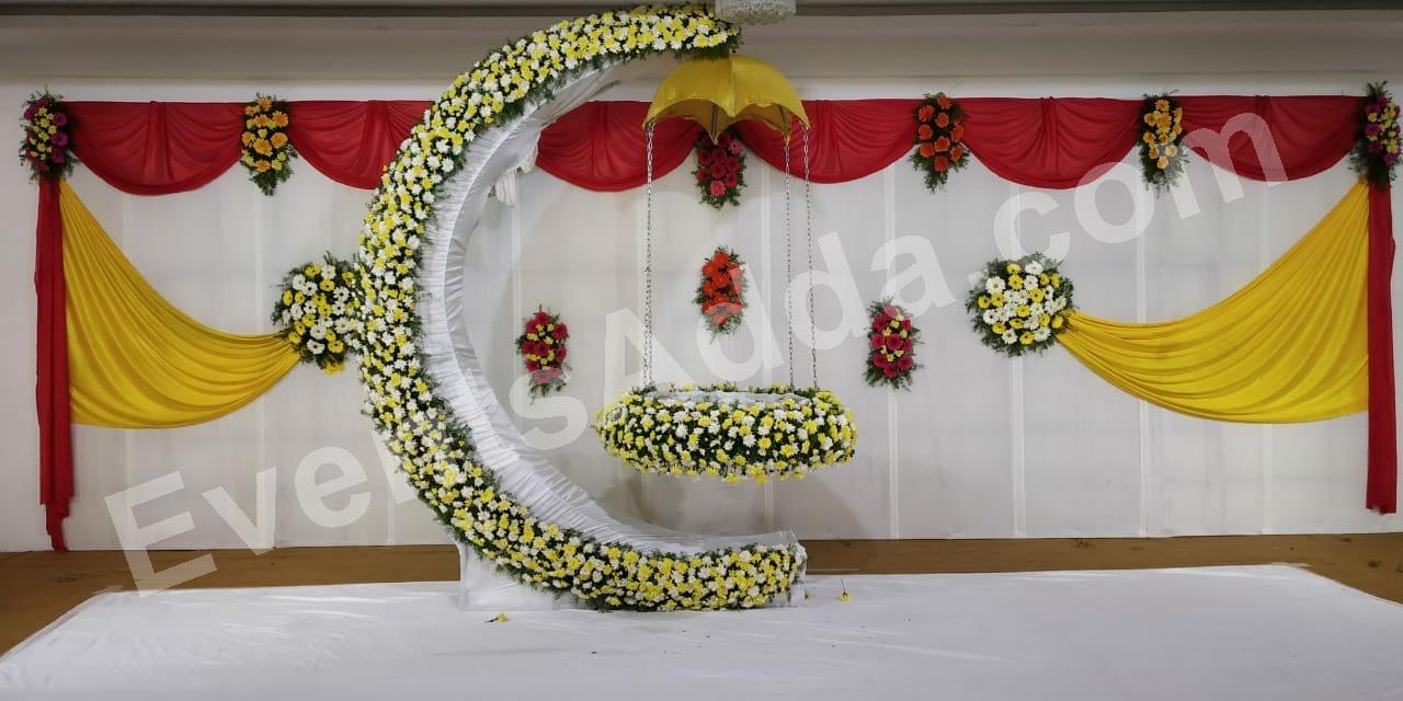 elegant-white-floral-moon-cradle-ceremony-decoration in Jorhat