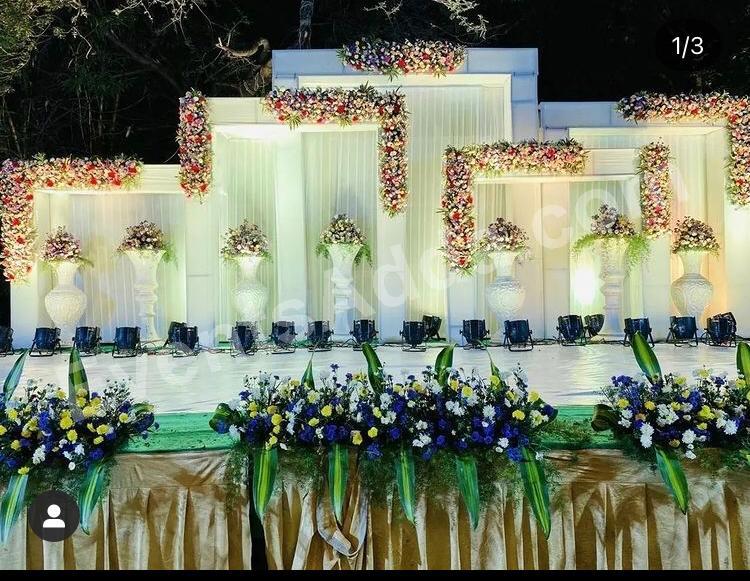 elegant-white-floral-panel-wedding-stage-decoration in Ahmedabad
