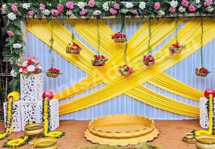 elegant-yellow-draped-floral-haldi-ceremony-decoration-3.jpg