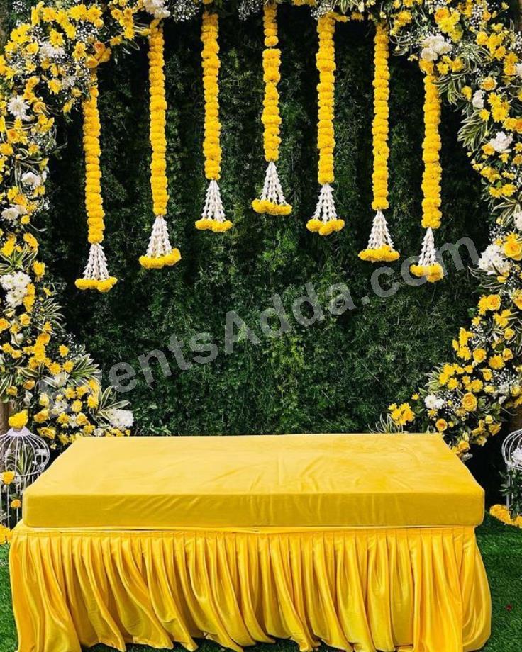 elegant-yellow-floral-haldi-ceremony-decoration-2.jpg