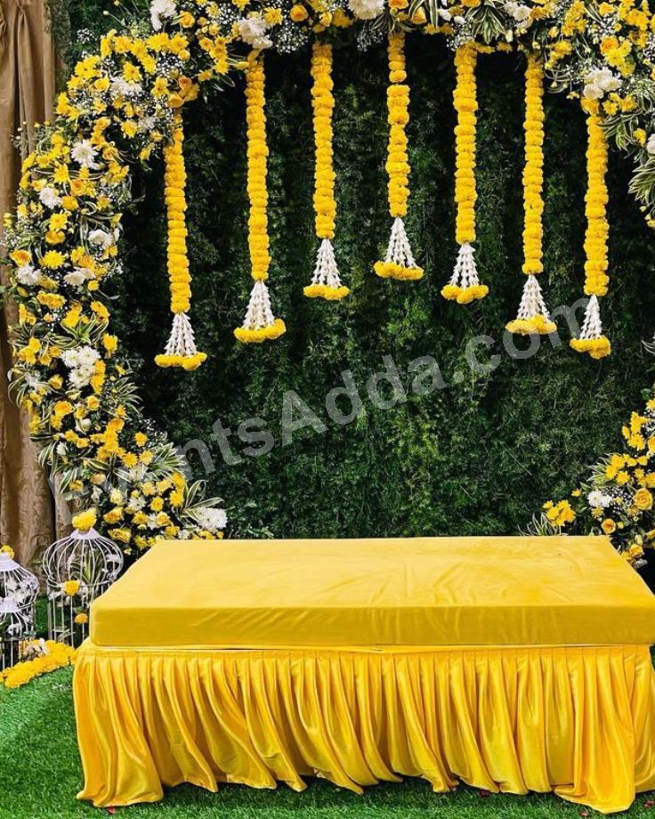elegant-yellow-floral-haldi-ceremony-decoration-3.jpg