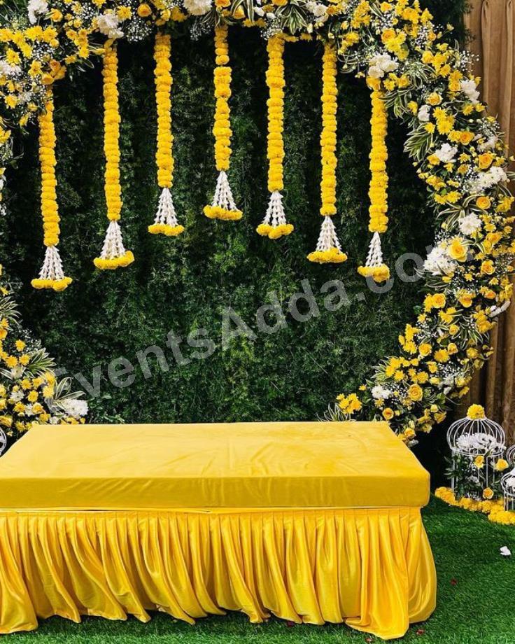 elegant-yellow-floral-haldi-ceremony-decoration-4.jpg