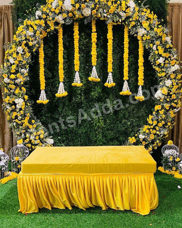 elegant-yellow-floral-haldi-ceremony-decoration in Ahmedabad