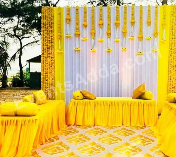 elegant-yellow-haldi-ceremony-lounge-decoration-3.jpg