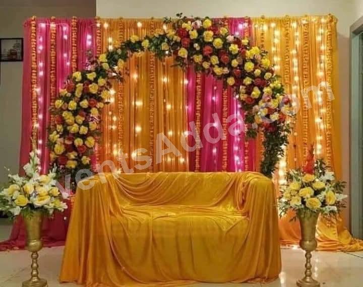 golden-glow-floral-mehendi--haldi-backdrop-decoration in Medchal