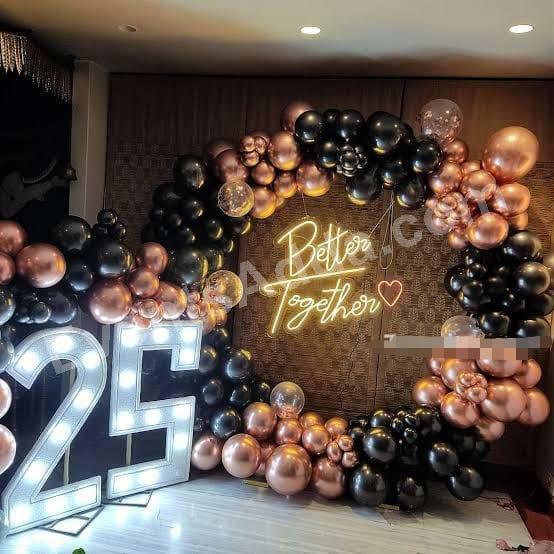 luxury-black-and--rose-gold-balloon-ring-anniversary-decoration Decoration in =Hyderabad