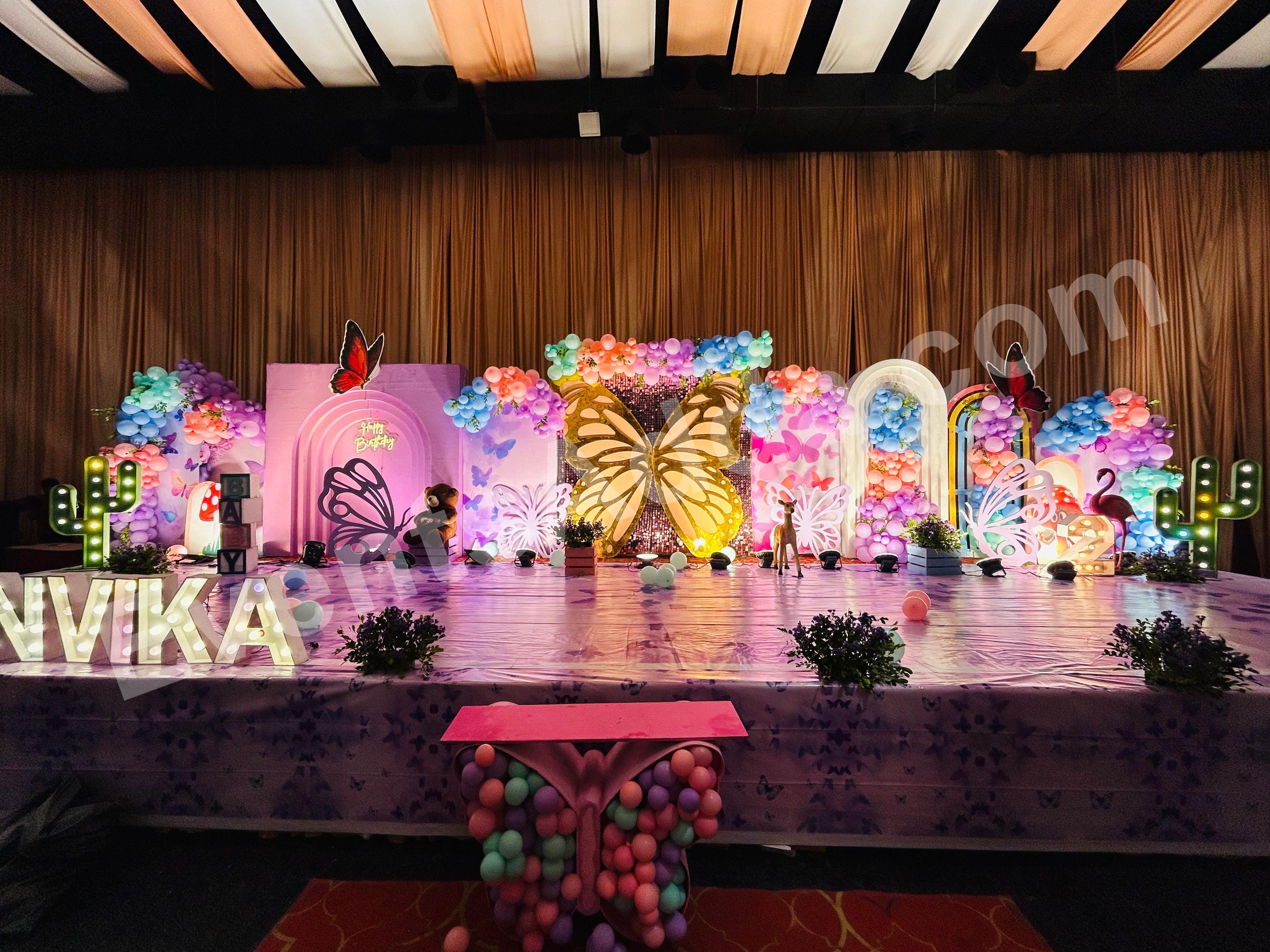 luxury-butterfly-garden-theme-first-birthday-stage-decoration Decoration in =Hyderabad