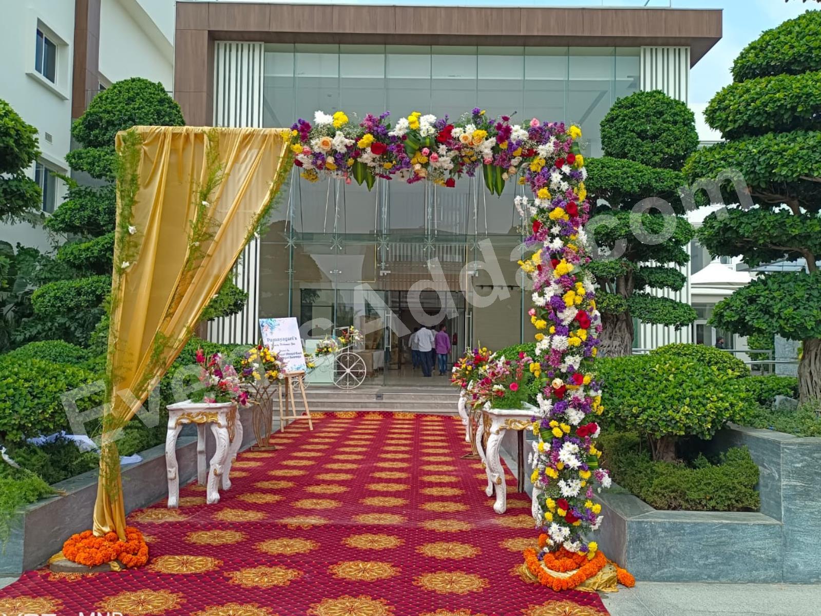luxury-floral-entrance-arch-with-gold-drapes-2.jpg