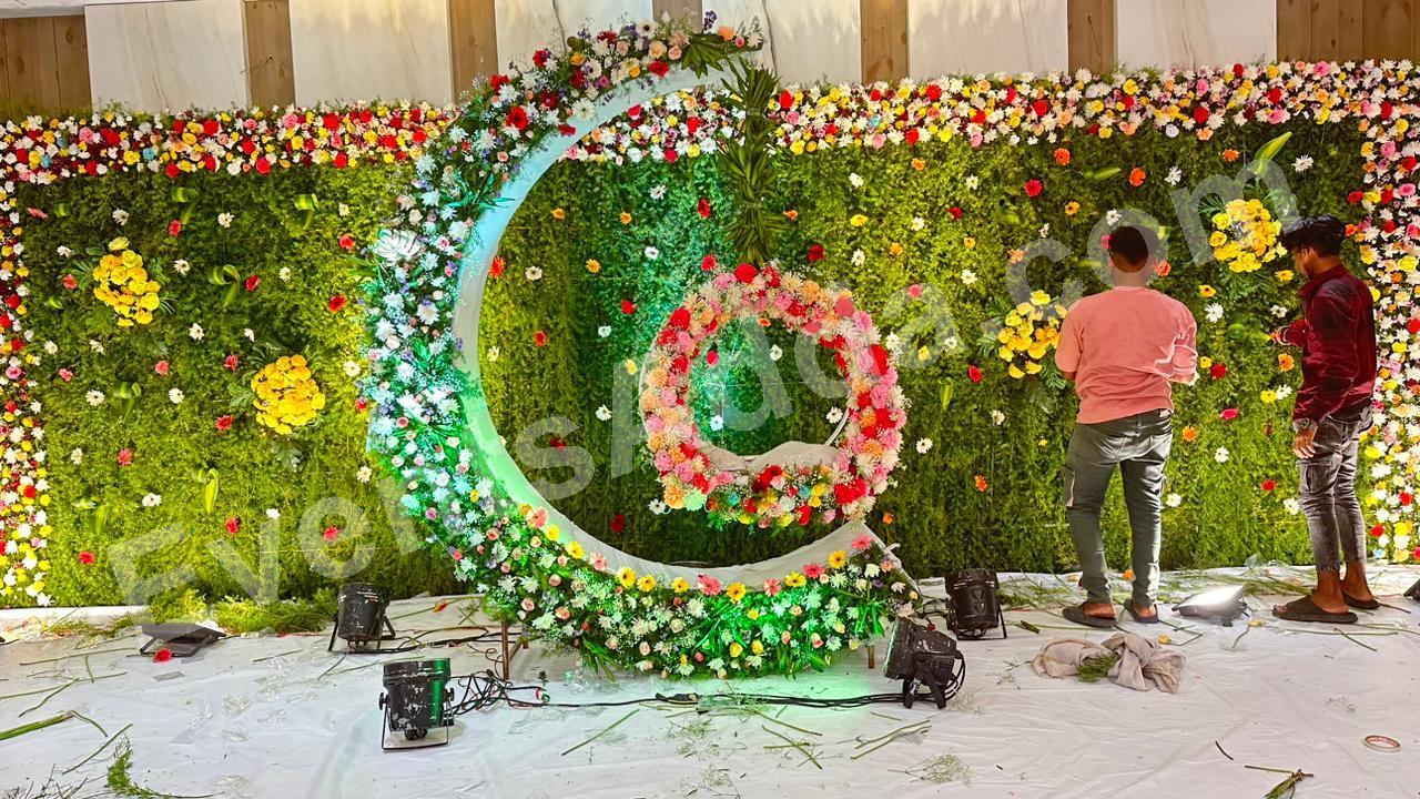 luxury-floral-moon-cradle-ceremony-stage-decoration in Jorhat