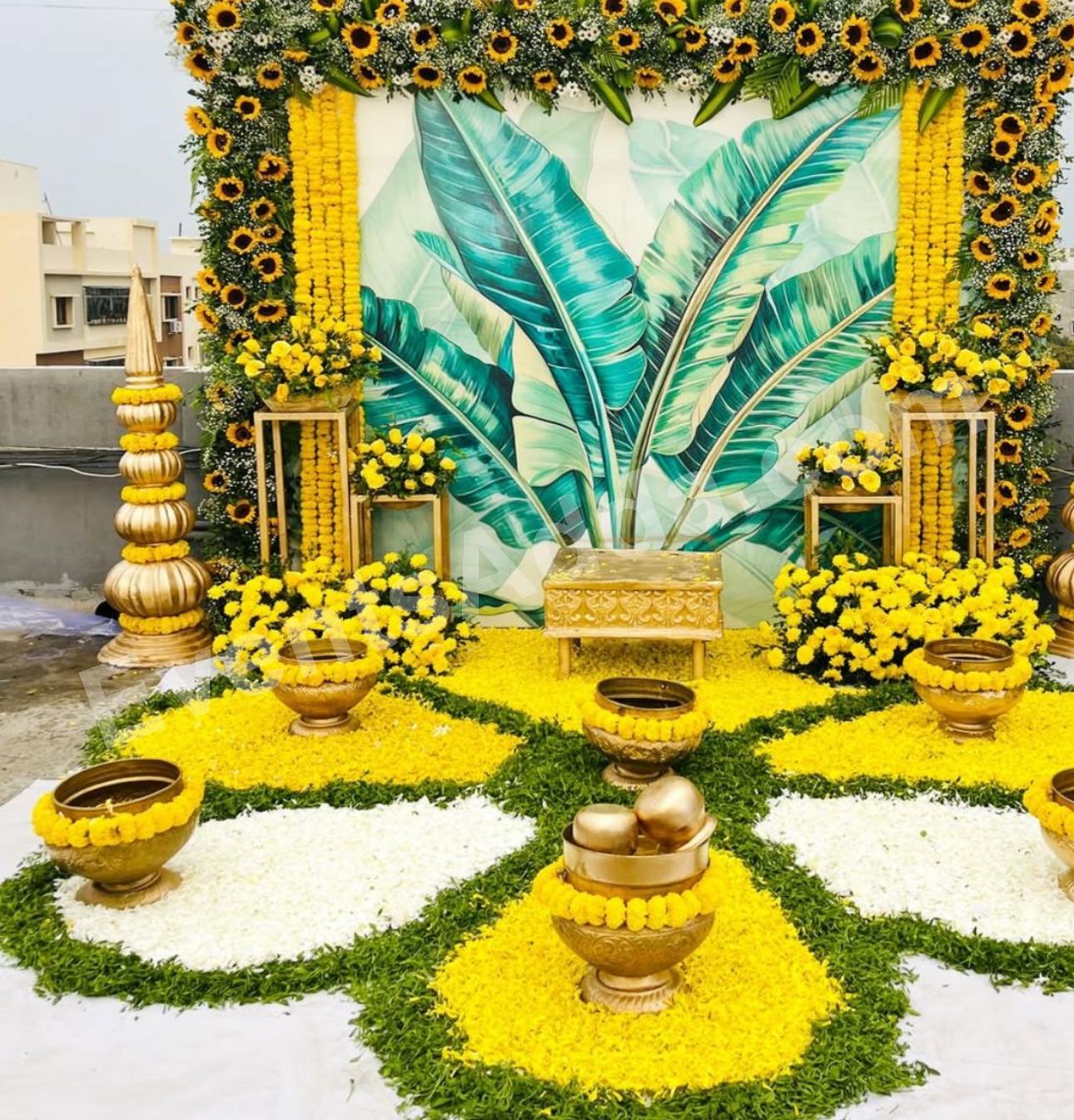 luxury-tropical-haldi-decoration-with-sunflower-theme-3.jpg