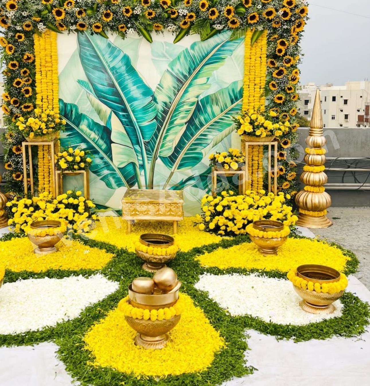 luxury-tropical-haldi-decoration-with-sunflower-theme-4.jpg