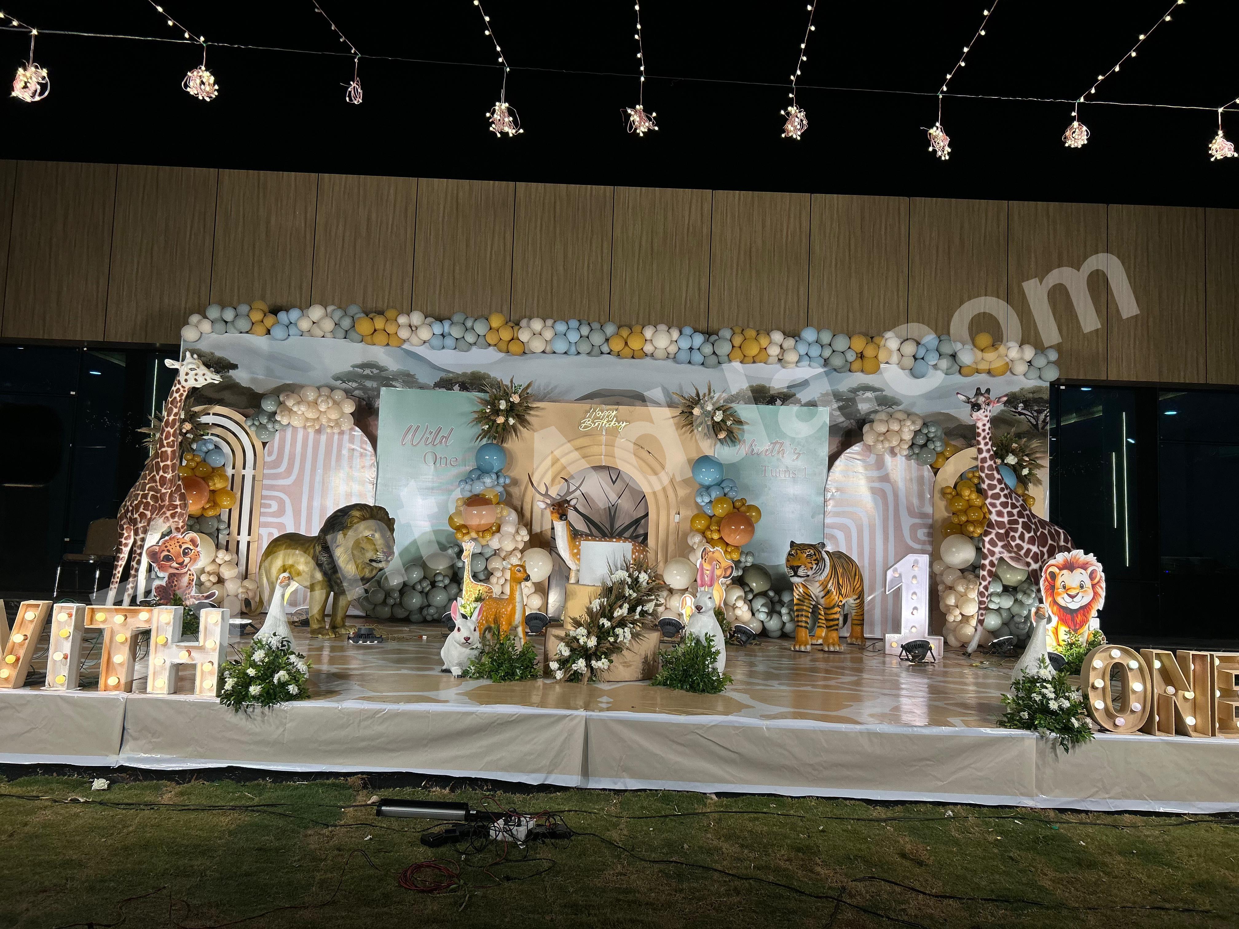 luxury-wild-one-jungle-safari-theme-first-birthday-stage-decoration Decoration in =Hyderabad