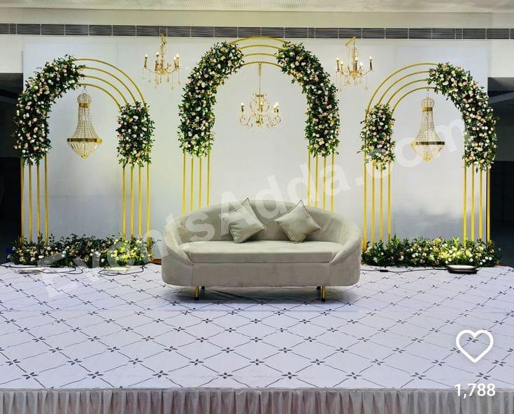 Modern Golden Arch Floral Stage Decoration Decoration in Siddipet
