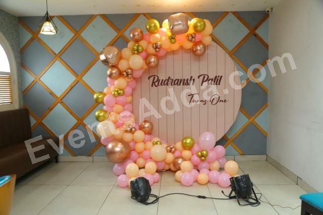pastel-balloon-first-birthday-ring-backdrop-decoration Decoration in =Hyderabad