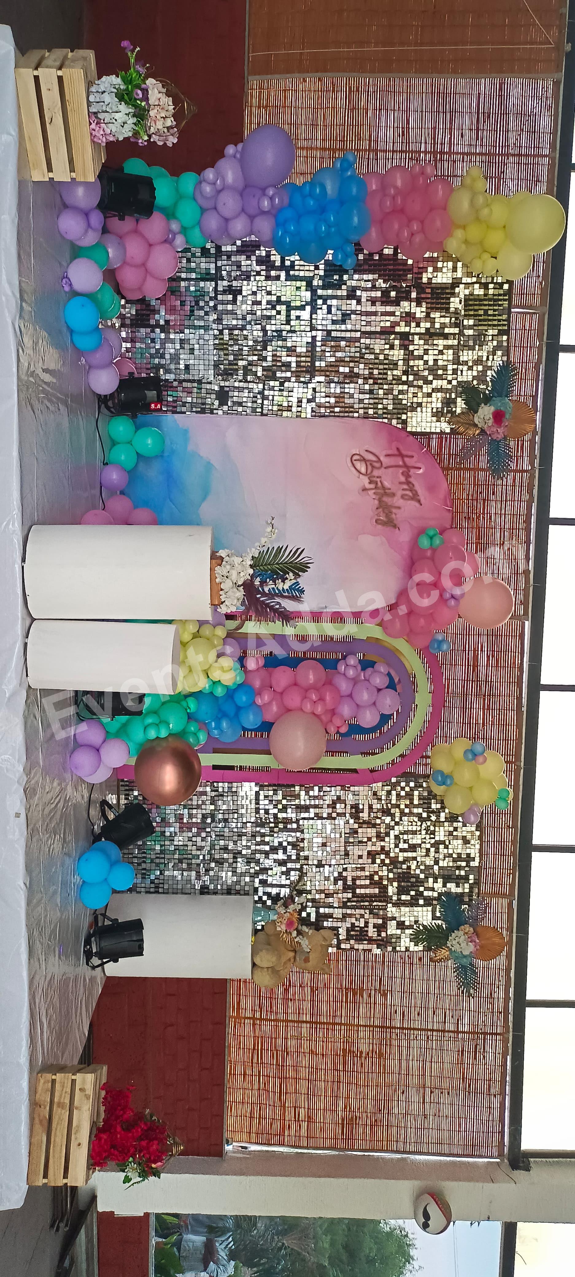 pastel-rainbow-birthday-stage-decoration-with-shimmer-backdrop Decoration in =Hyderabad