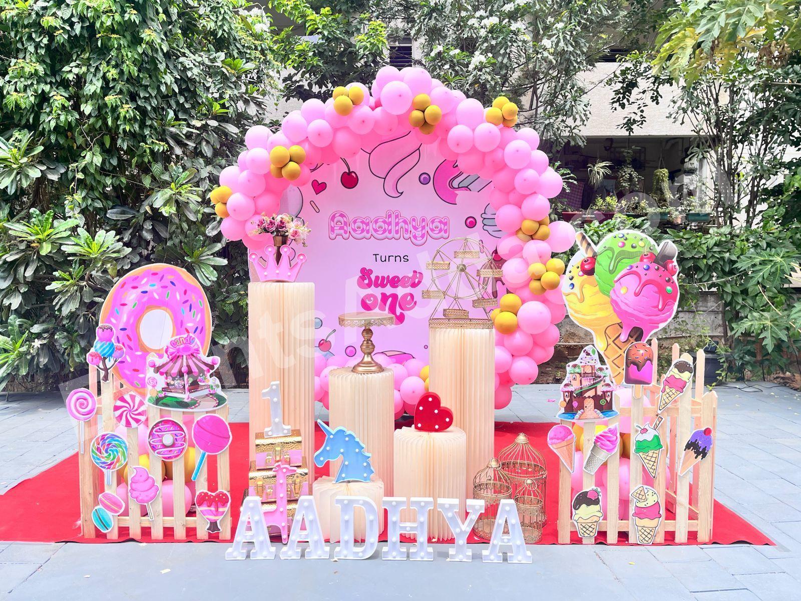 Pink Candy Themed First Birthday Decoration in Hyderabad