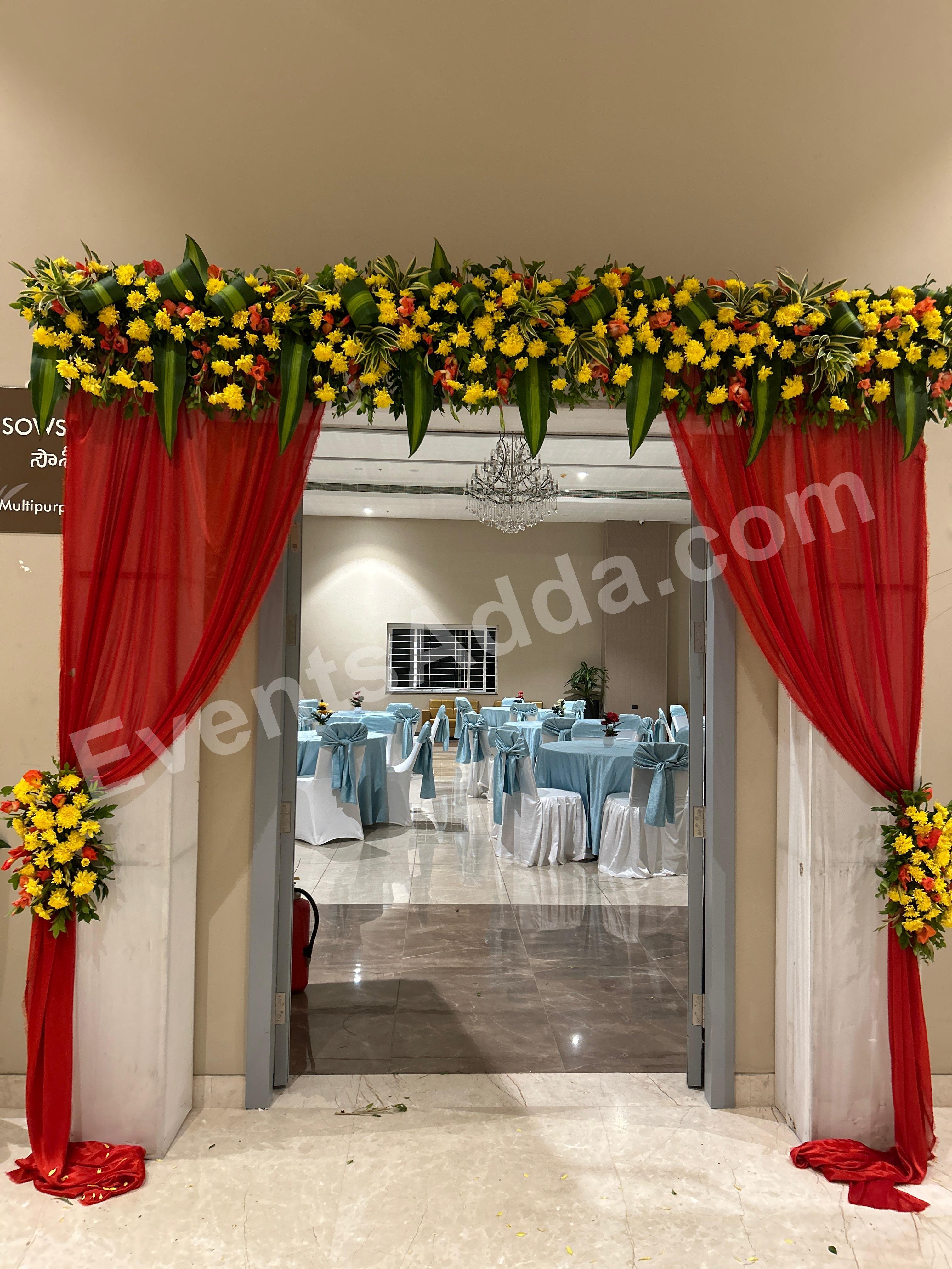 premium-floral-entrance-gate-decoration-with-red-drapes in Jorhat