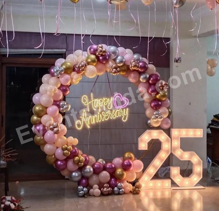 rose-gold-25th-anniversary-balloon-decoration in Nagarkurnool