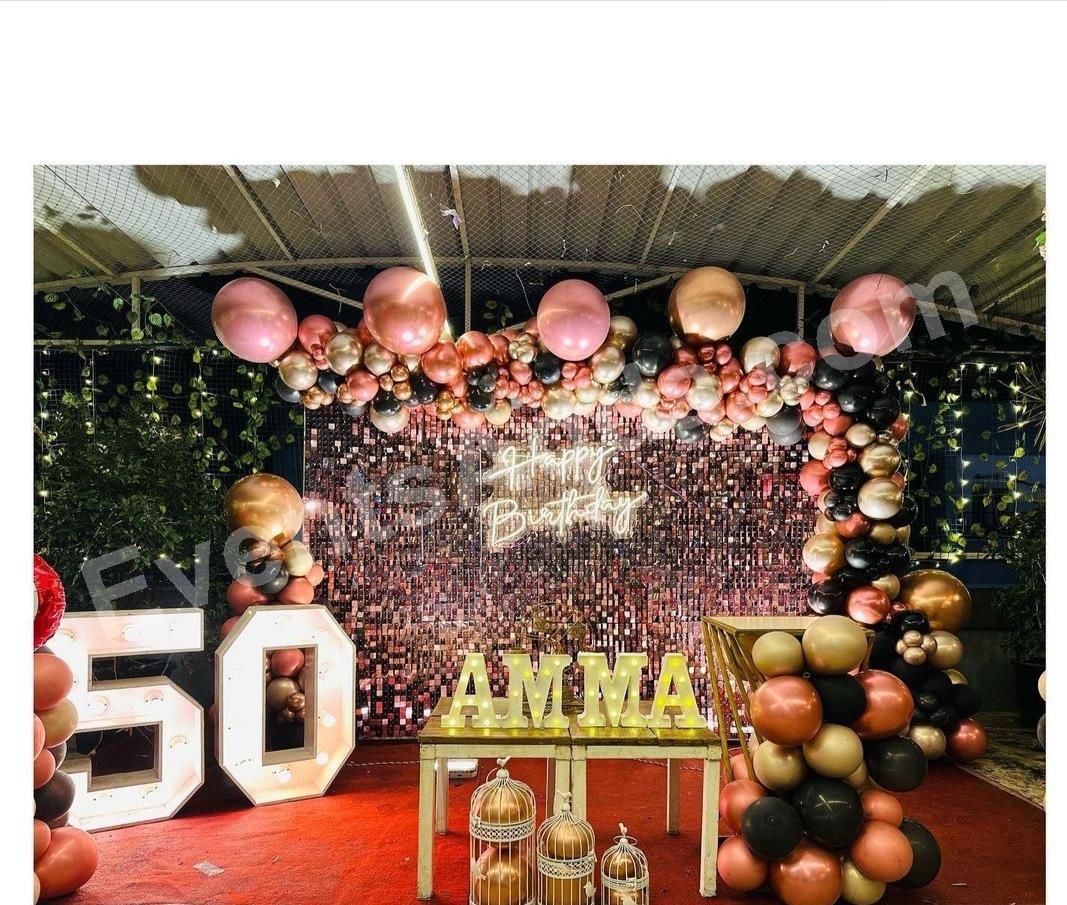 rose-gold-shimmer-birthday-backdrop-decoration-with-led-age-number--amma-marquee-letters in Vijayawada