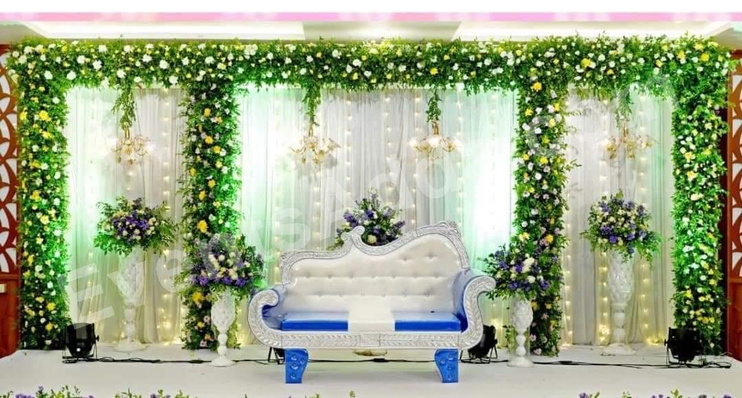 royal-green--white-floral-wedding-stage-decoration in Siddipet