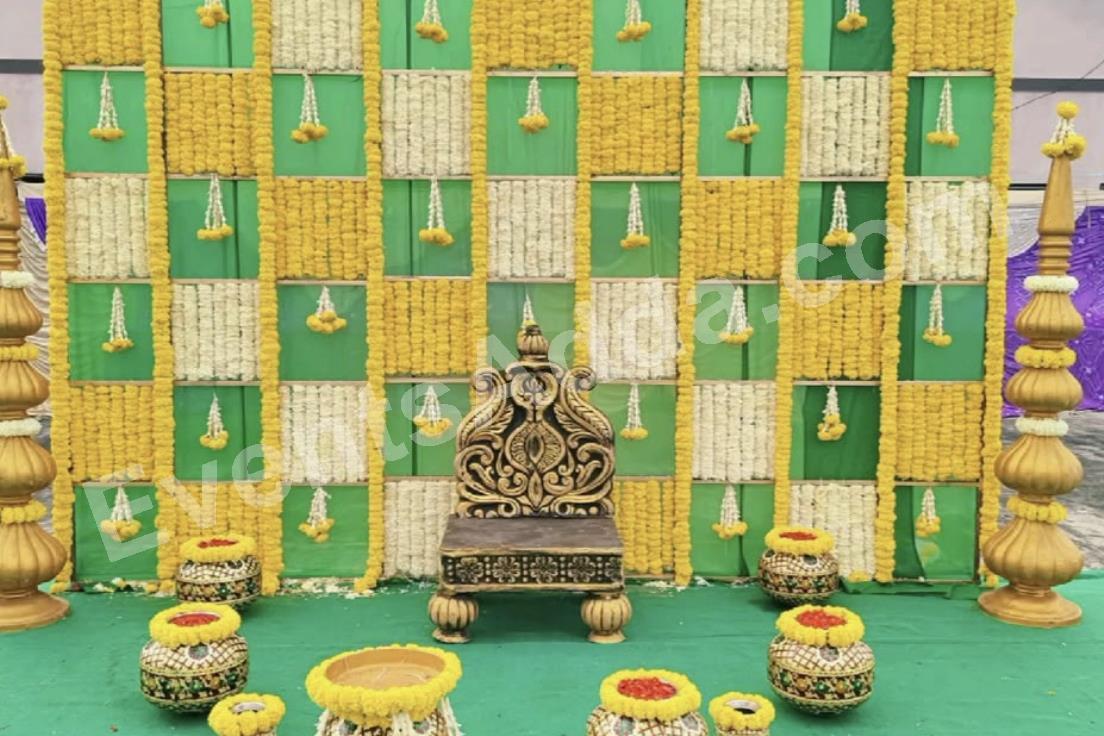 royal-green-and-yellow-marigold-haldi-decoration-2.jpg