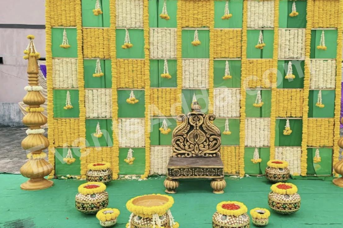royal-green-and-yellow-marigold-haldi-decoration-3.jpg